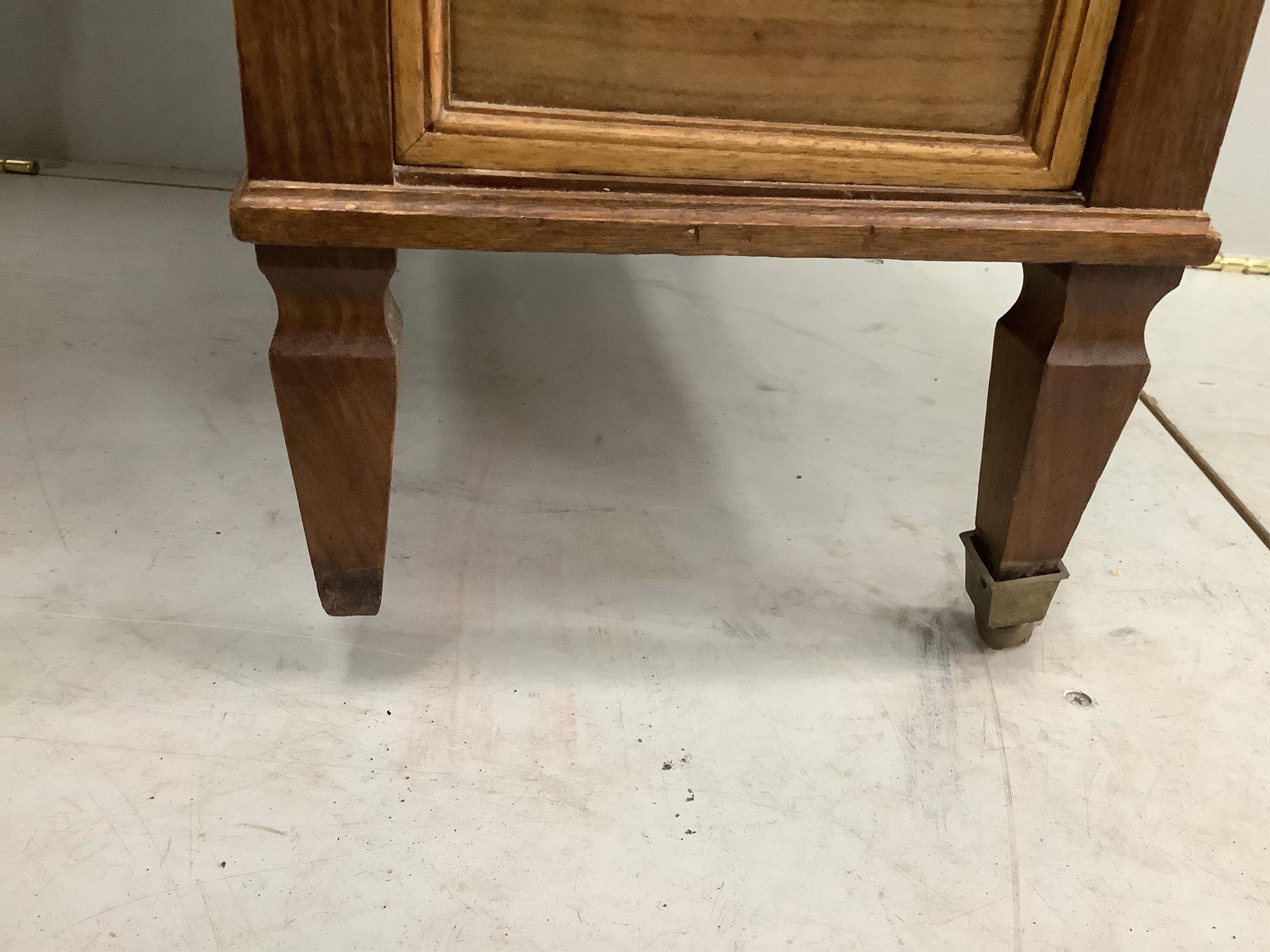 A late Victorian walnut nine drawer kneehole desk, missing two castors and one handle, width 112cm, depth 59cm, height 78cm